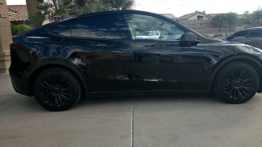 Black Tesla Model Y after exterior refresh service